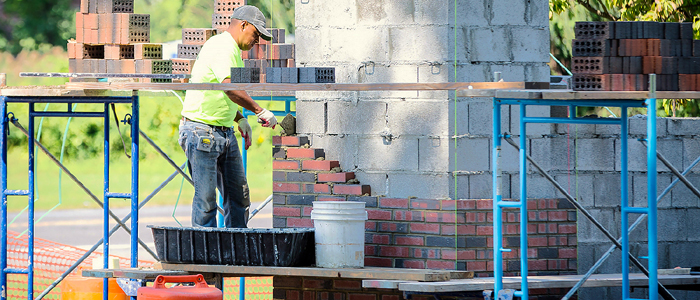 Mason Laying Bricks